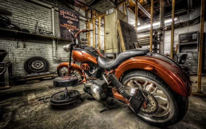 Orange Harley-Davidson Motorcycle in a Garage