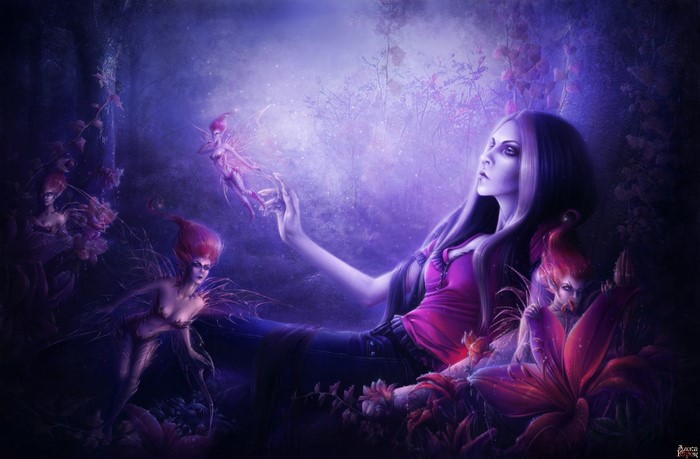 Woman interacting with fairies in a magical forest