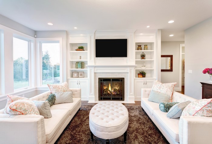 Living room with fireplace and sofas