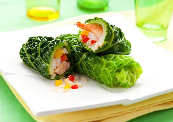 Shrimp and rice cabbage rolls with bell peppers