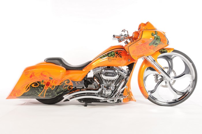 Custom orange motorcycle with elaborate paintwork