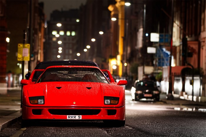 Red Ferrari F40 on a Wet City Street at Night