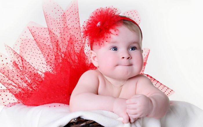Baby girl in red tutu and headband