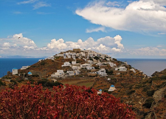 White village on a hill overlooking the sea in Greece