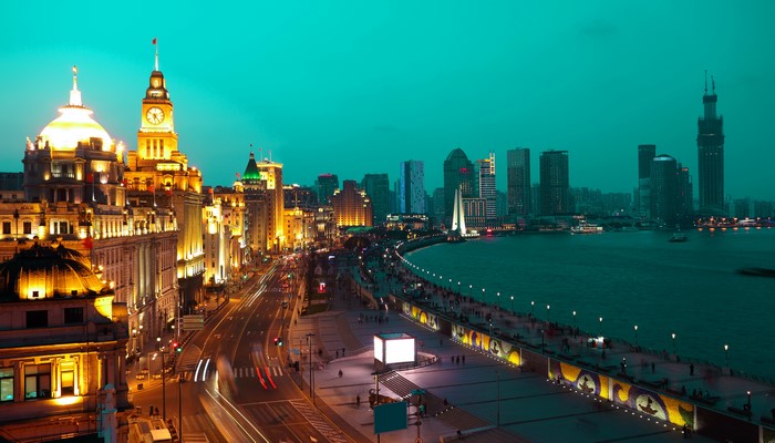 Shanghai skyline with Bund buildings and Pudong skyscrapers at night