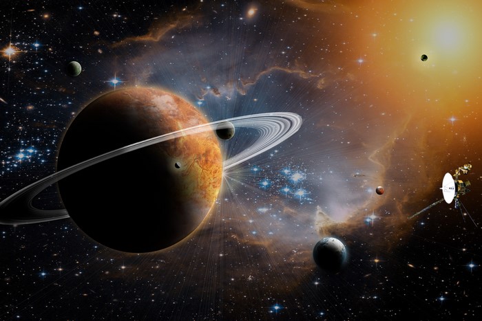Planets and a spacecraft in outer space