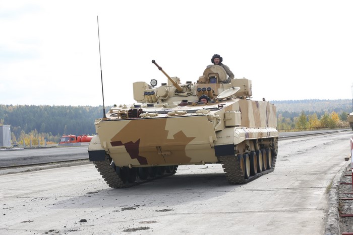 Military vehicle with camouflage pattern