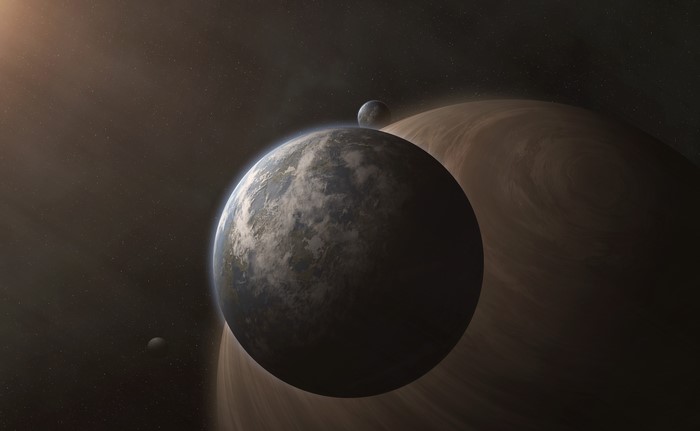 Planets in space with moons and rings