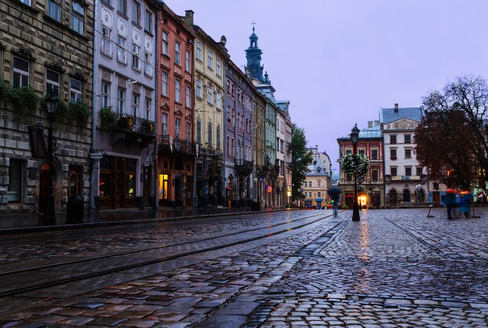 Cobblestone street with colorful buildings in Lviv, Ukraine
