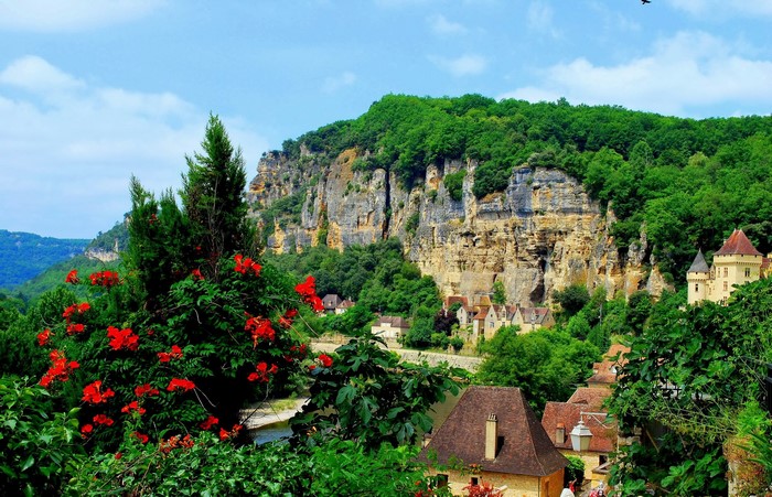 La Roque Gageac village nestled against a cliff in France