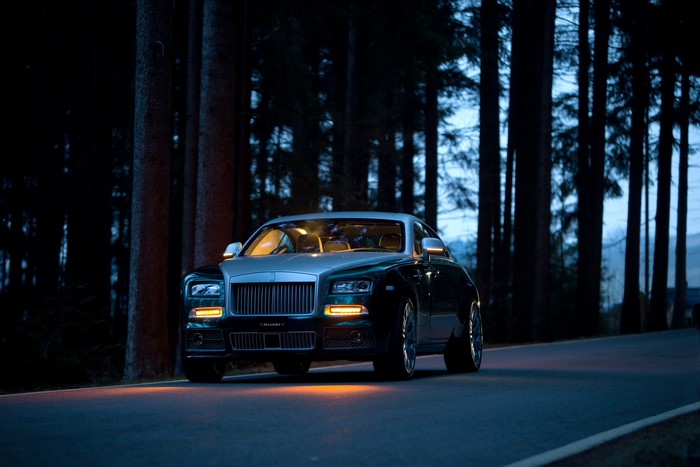 Rolls-Royce Wraith (Mansory) at night in forest