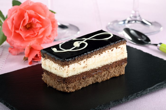Chocolate cake with rose and spoon