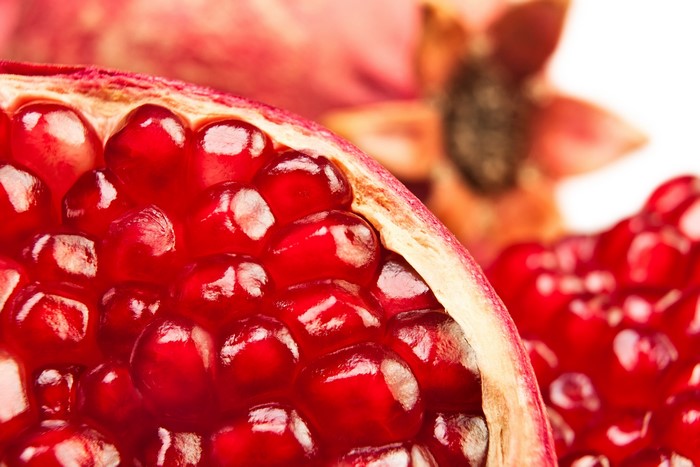 Close-up of a ripe pomegranate with seeds
