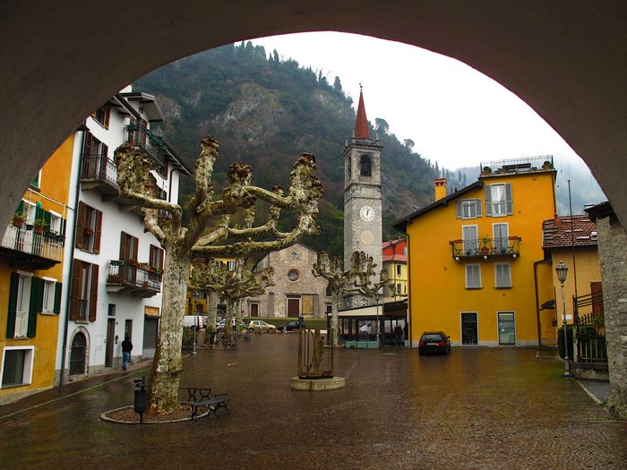 Varenna, Italy town square with church tower