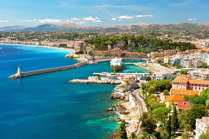 View of Nice, France harbor with lighthouse and buildings