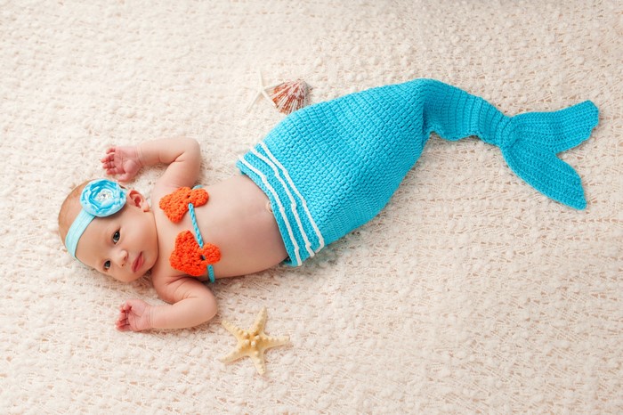 Baby in a mermaid costume