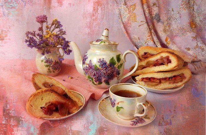Still life with tea, pie, and flowers