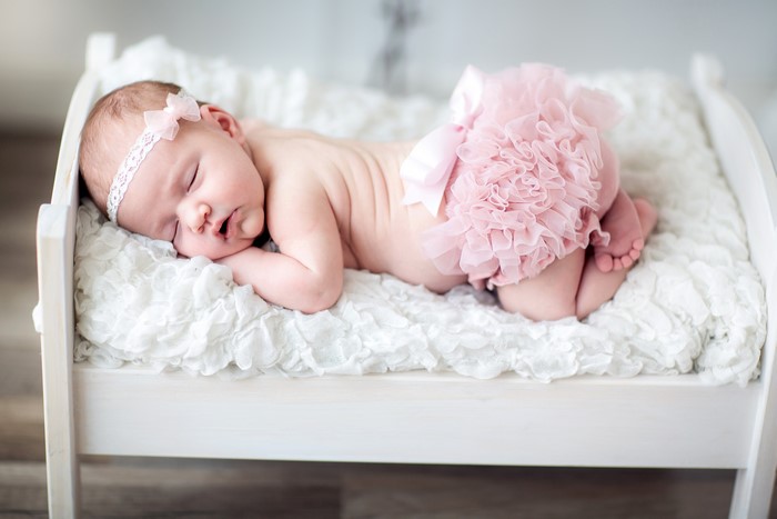 4K Newborn Baby Sleeping on a Bed