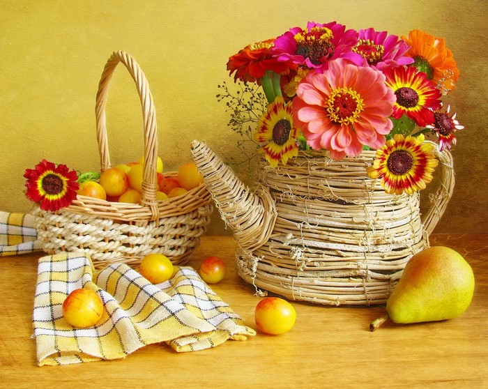 Still-life with zinnias, plums, pears, and wicker basket
