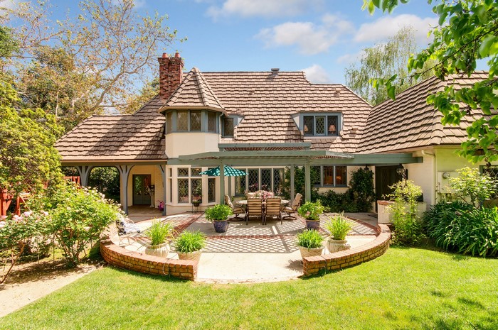 Tudor-style house with a patio and garden
