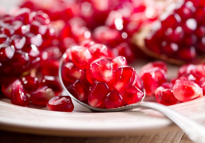 Close-up of Pomegranate Seeds on a Spoon