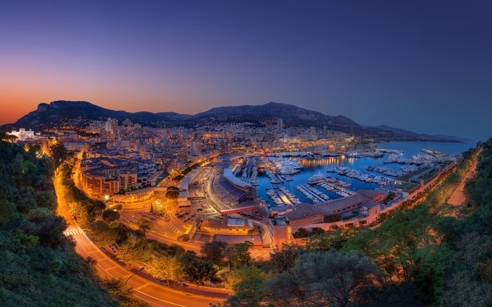 4K Monaco cityscape with marina at dusk