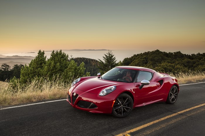 Red Alfa Romeo 4C on a Mountain Road