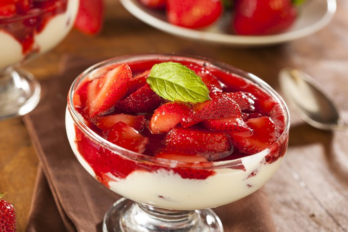 Strawberry dessert with cream and mint