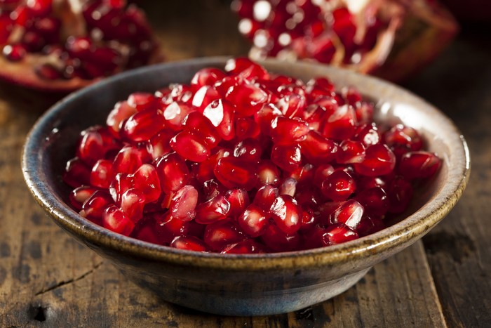 Pomegranate seeds in a bowl
