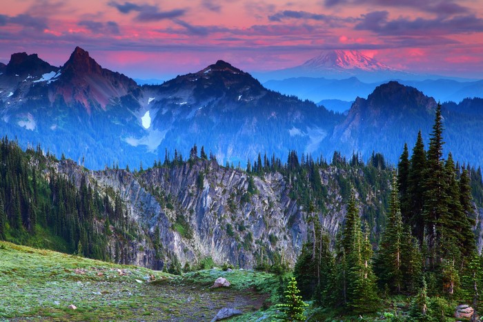 Mount Rainier National Park at sunset with pink clouds