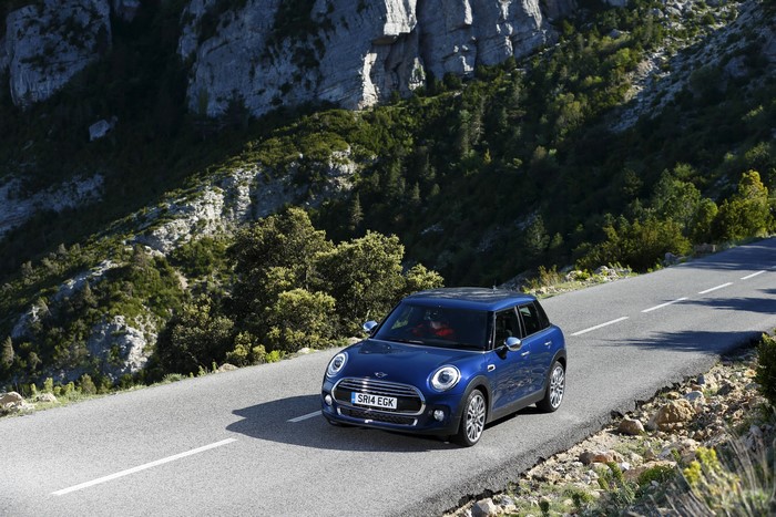 Blue 2014 Mini Cooper D 5-door on a mountain road