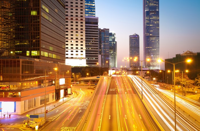 Hong Kong Skyscrapers and City Road at Night