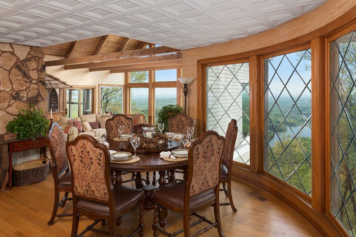 Dining room with large windows and scenic view