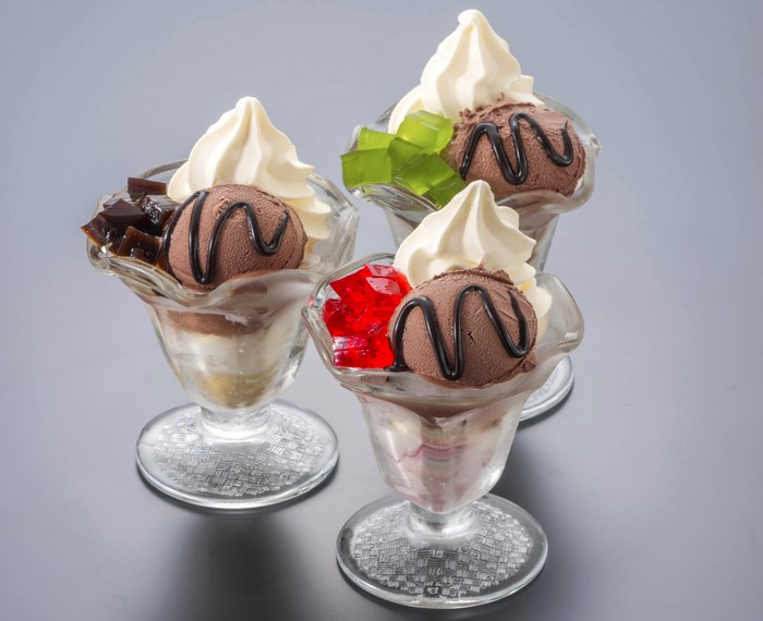 Three ice cream parfaits with jelly