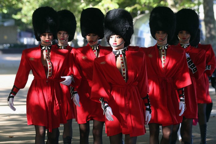 Models in Crazy Horse cabaret uniforms
