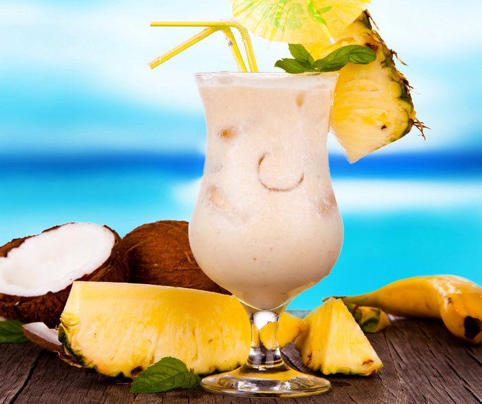 Pina Colada cocktail with pineapple, coconut, and banana