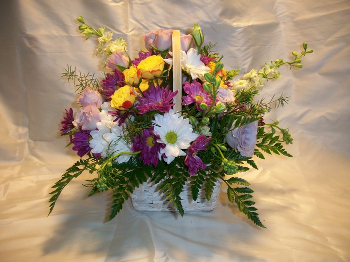 Flower arrangement in a wicker basket