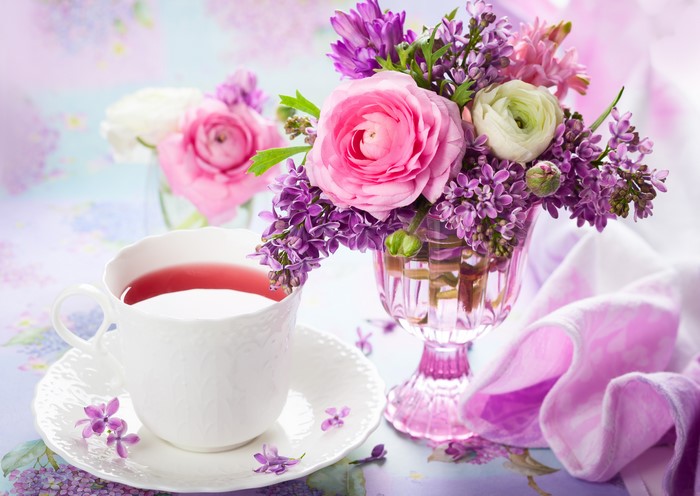 Still-life of tea cup and flowers