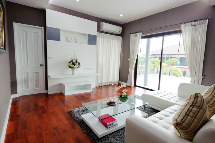 Modern Living Room with White Sofa and Glass Table