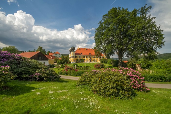 Schloss Ramspau castle in Bavaria, Germany with gardens