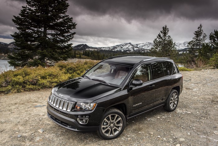 Black 2014 Jeep Compass Limited in a Mountainous Landscape