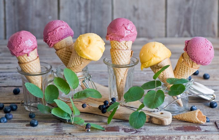 Ice cream cones with blueberries and leaves