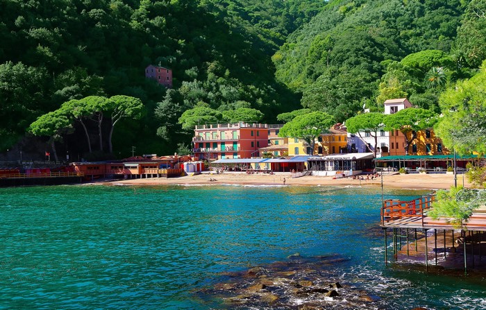 Colorful buildings on a beach in Portofino, Italy