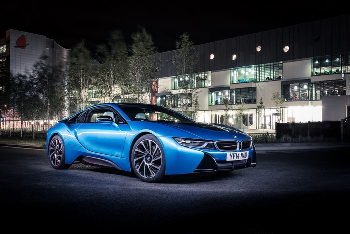 Blue 2014 BMW i8 parked at night
