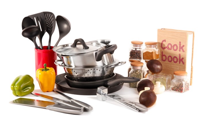 Still-life of kitchenware, spices, and vegetables