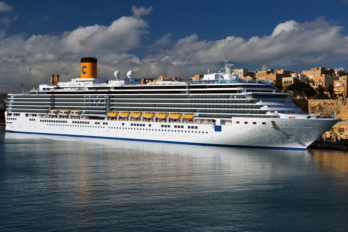 Costa Deliziosa cruise ship docked in a harbor