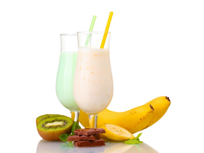 Two milkshakes with bananas, kiwi, and chocolate