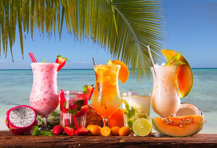 Tropical Cocktails and Fruits on a Beach