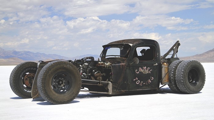 Rat rod tow truck with "Camel Toe-ing" text