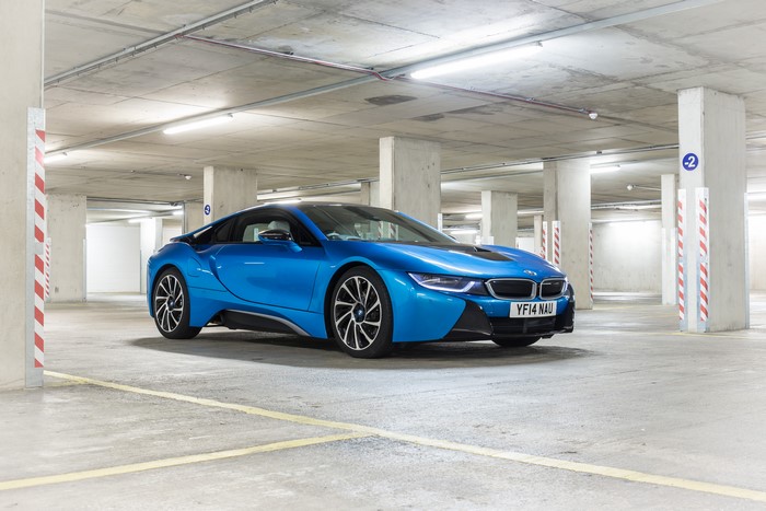 Blue 2014 BMW i8 in parking garage